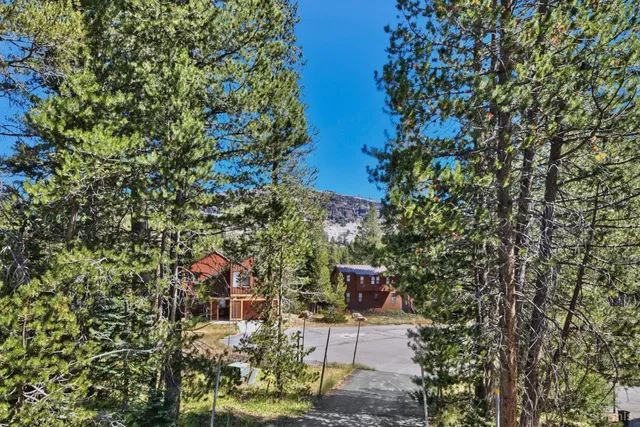 a view of a city with mountains in the background