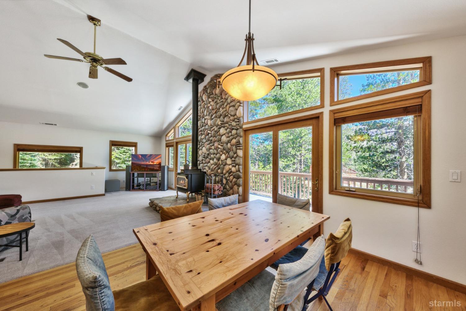 34235 Fremont Road Kirkwood, CA 95646 - Photo 9 of 29 a view of a dining room with furniture window and wooden floor
