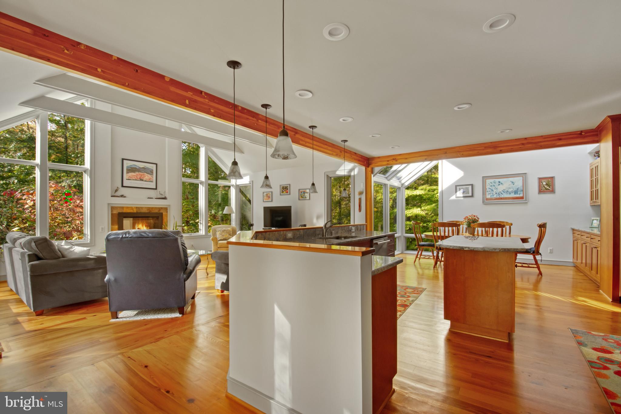 201 Biggs Purchase Lane Lothian, MD 20711 - Photo 11 of 42 a living room with furniture a large window and wooden floor
