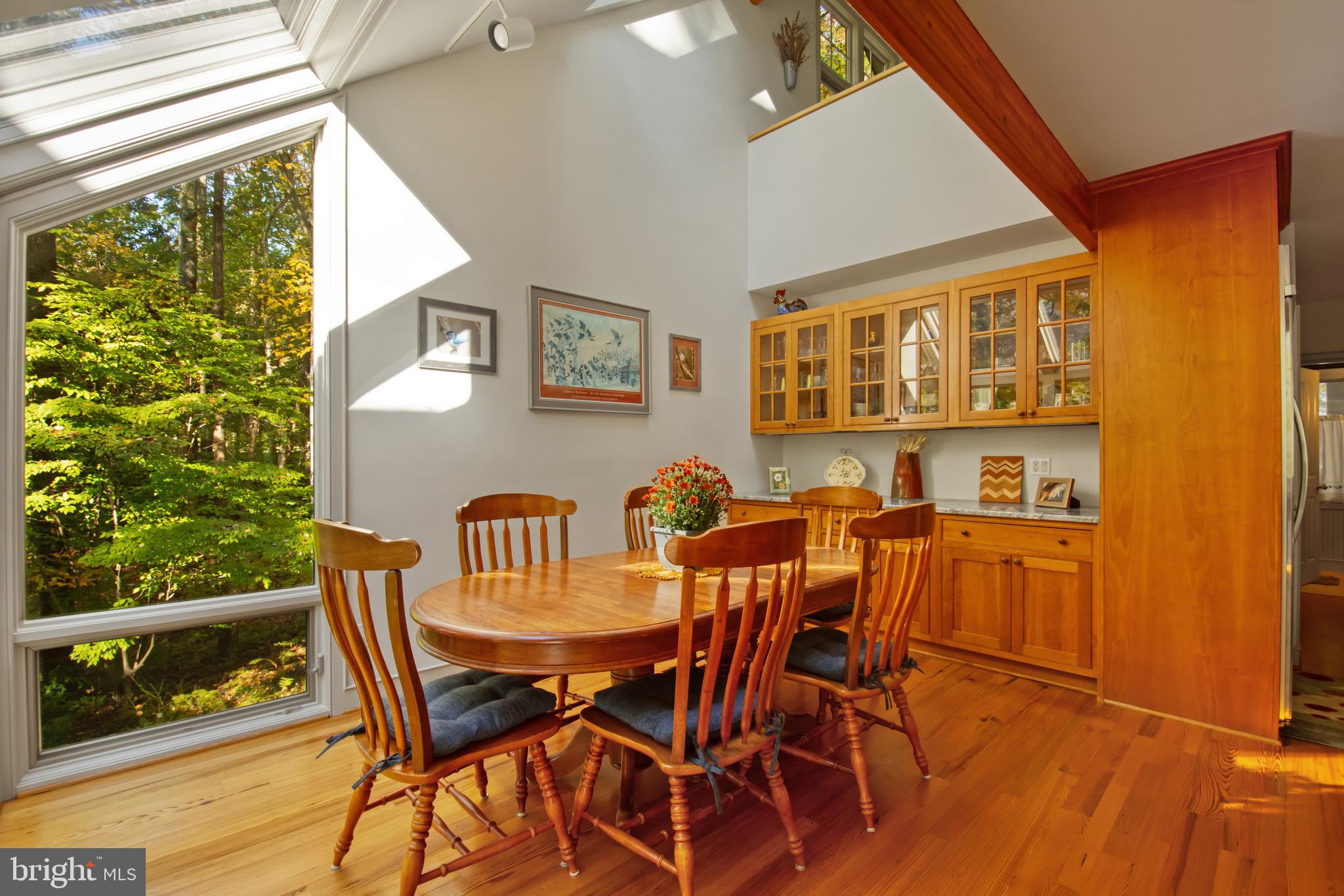201 Biggs Purchase Lane Lothian, MD 20711 - Photo 13 of 42 a view of a dining room with furniture and window