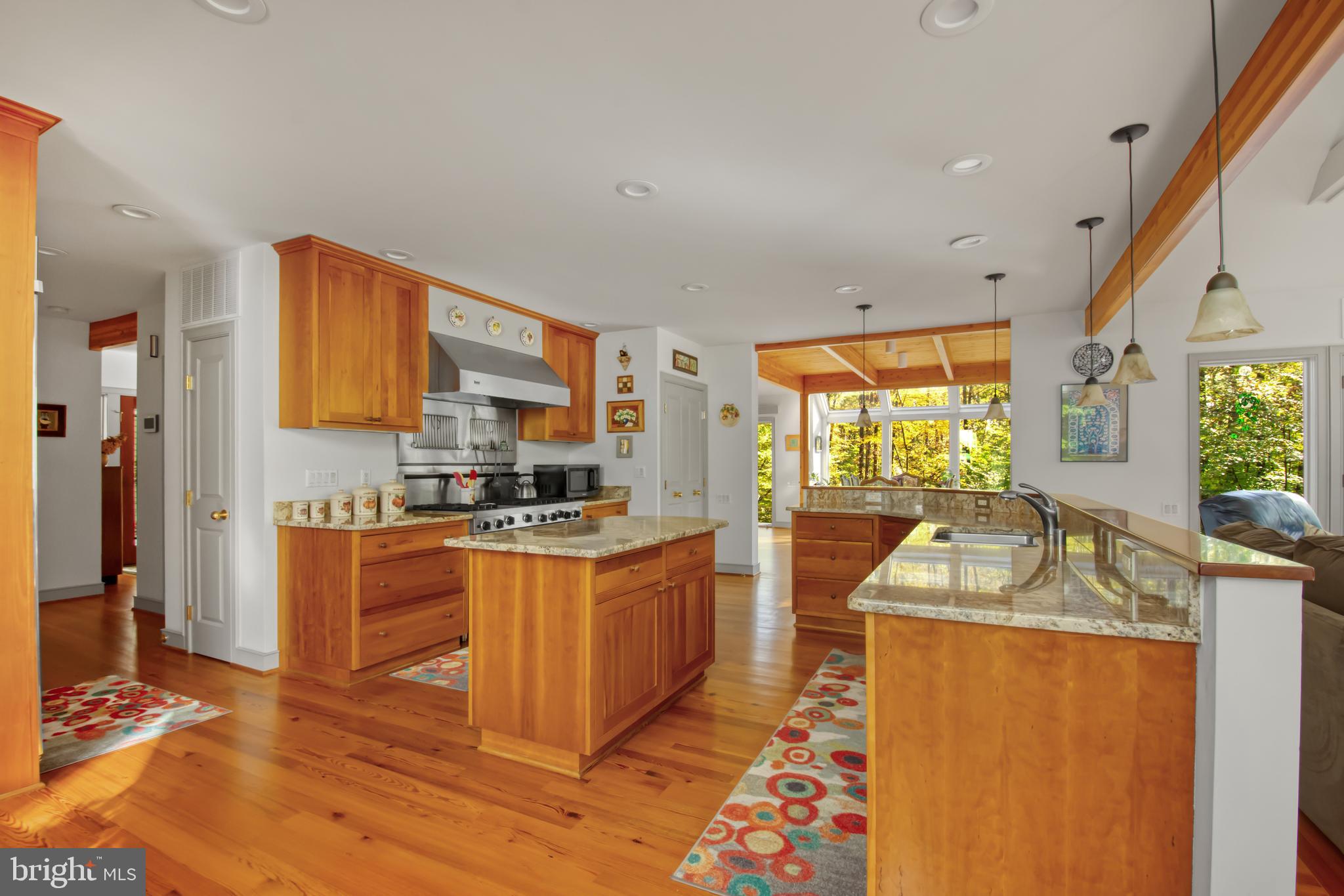 201 Biggs Purchase Lane Lothian, MD 20711 - Photo 14 of 42 a kitchen with stainless steel appliances granite countertop a sink stove and refrigerator