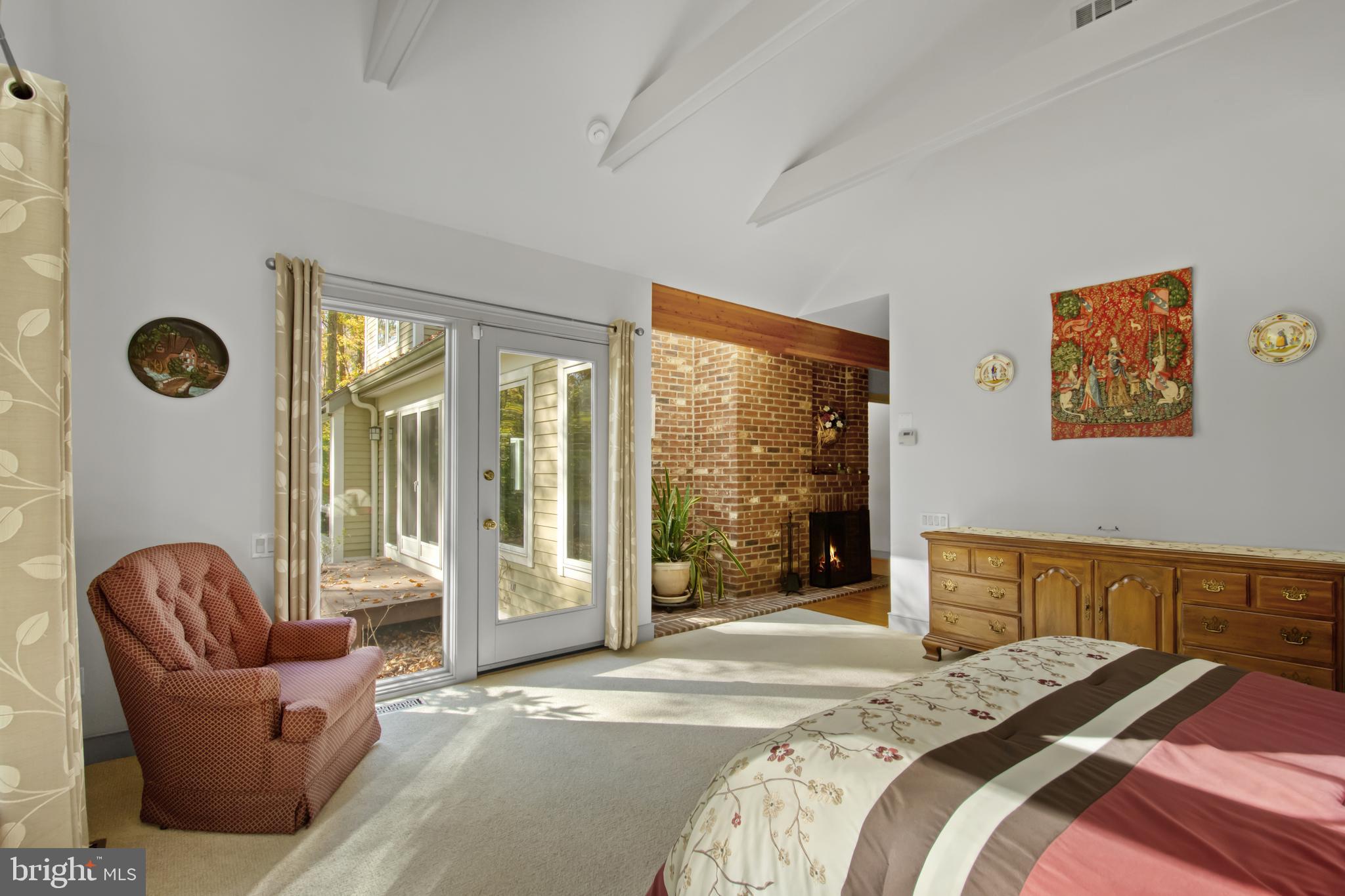 201 Biggs Purchase Lane Lothian, MD 20711 - Photo 22 of 42 a bedroom with furniture and a large window