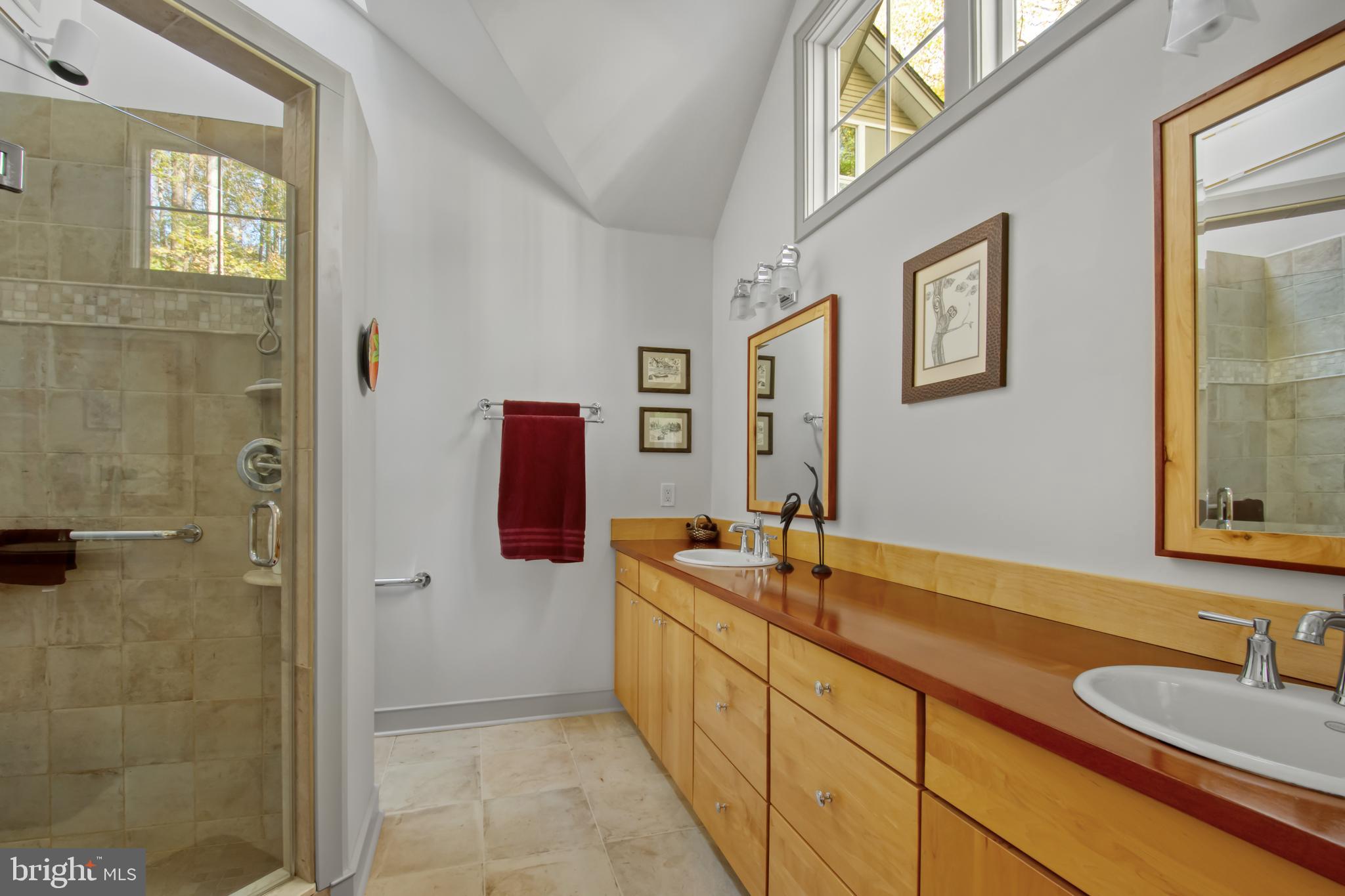 201 Biggs Purchase Lane Lothian, MD 20711 - Photo 25 of 42 a spacious bathroom with a granite countertop sink mirror and shower