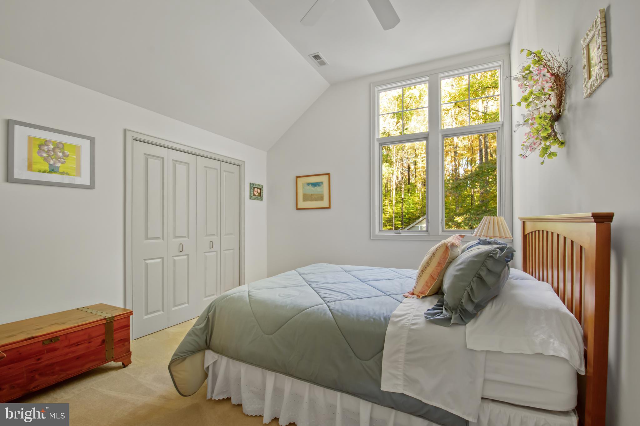 201 Biggs Purchase Lane Lothian, MD 20711 - Photo 30 of 42 a bedroom with a bed and a window