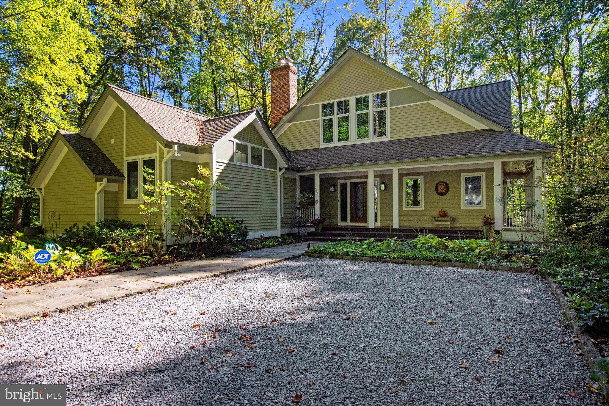 201 Biggs Purchase Lane Lothian, MD 20711 - Photo 3 of 42 a front view of a house with a yard
