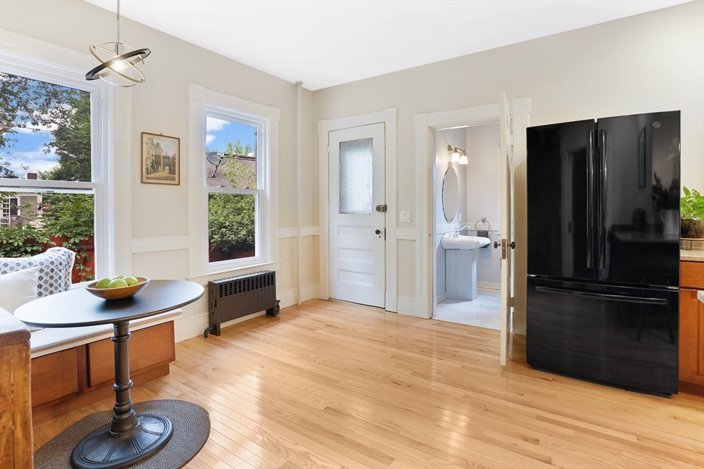 161 Longhill Street Springfield, MA 01108 - Photo 16 of 40 a living room with furniture and a wooden floor