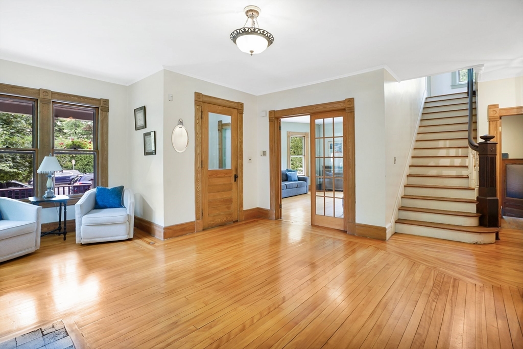 161 Longhill Street Springfield, MA 01108 - Photo 5 of 40 a view of a livingroom with wooden floor and furniture