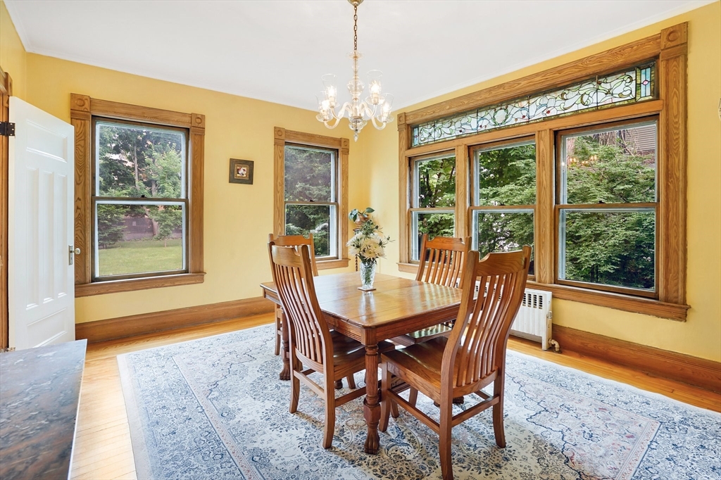 161 Longhill Street Springfield, MA 01108 - Photo 8 of 40 a view of a dining room with furniture window and wooden floor