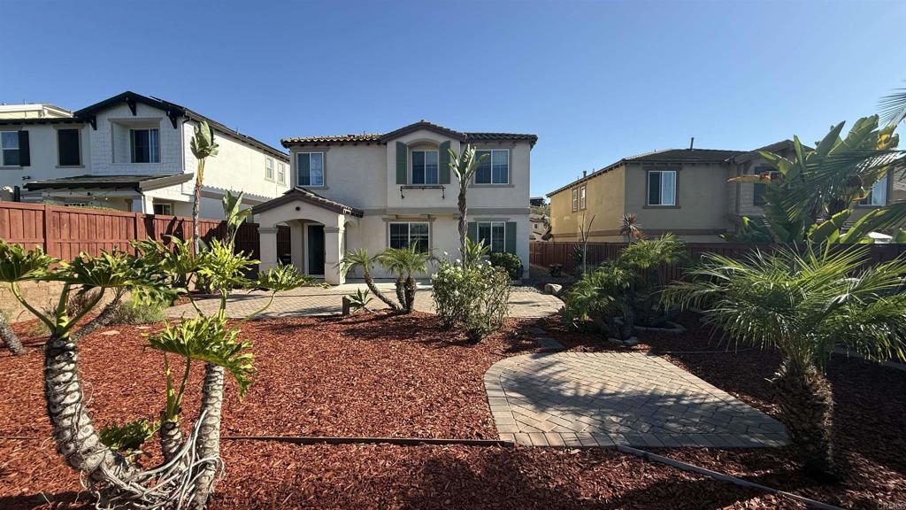 3422 Arborview Drive San Marcos, CA 92078 - Photo 6 of 21 a front view of a house with a yard