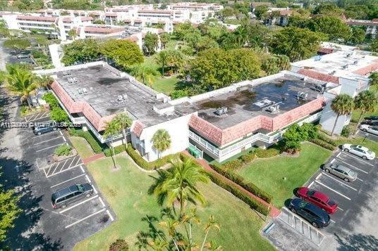 3772 Inverrary Boulevard, Unit 201 Lauderhill, FL 33319 - Photo 33 of 35 an aerial view of a house with a yard