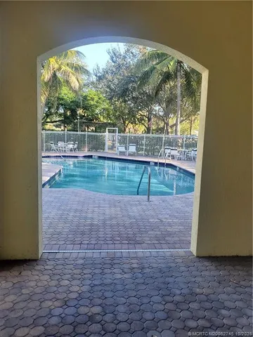 a view of backyard with green space