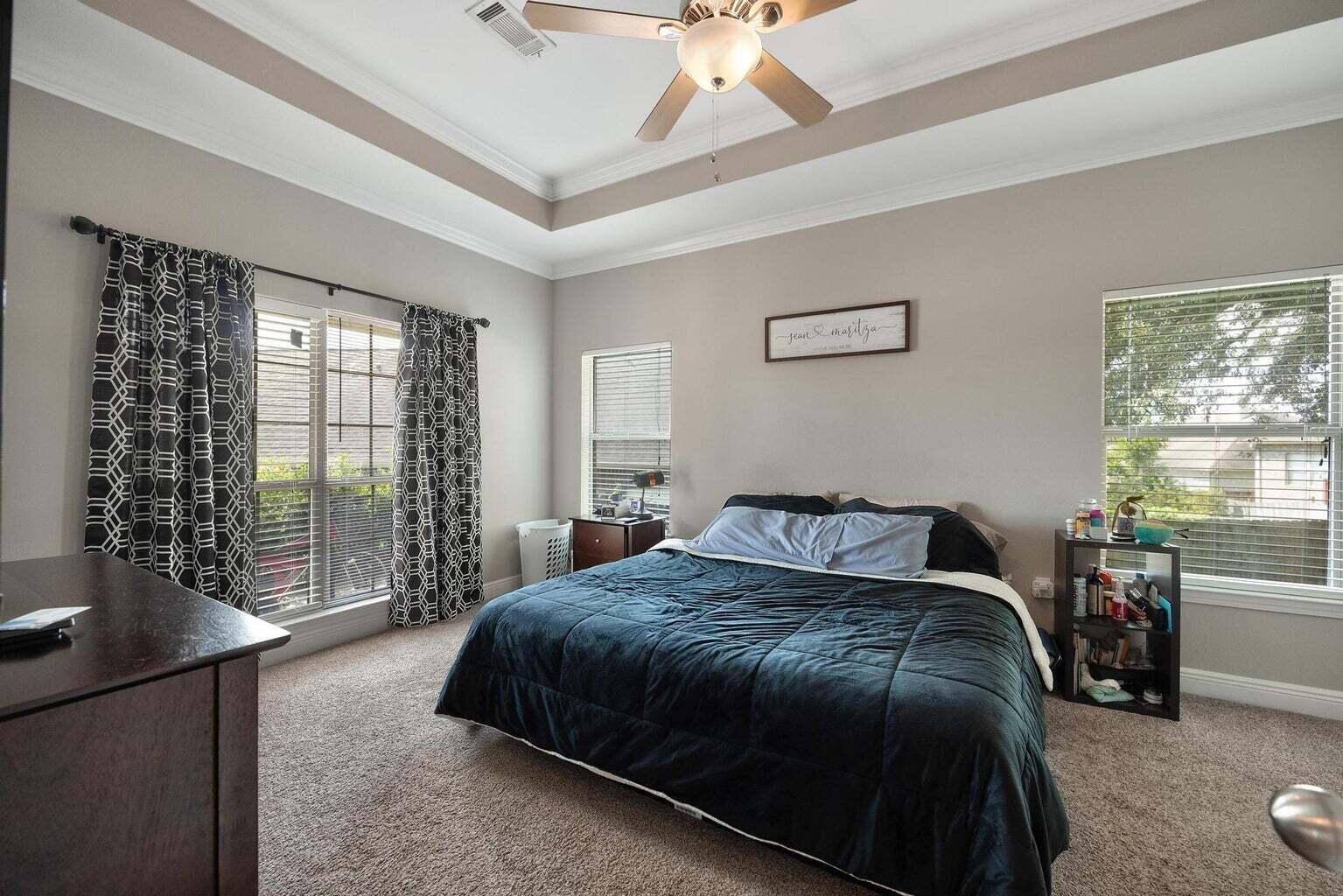 607 Rowan Circle Crestview, FL 32536 - Photo 20 of 27 a bedroom with a bed and a window