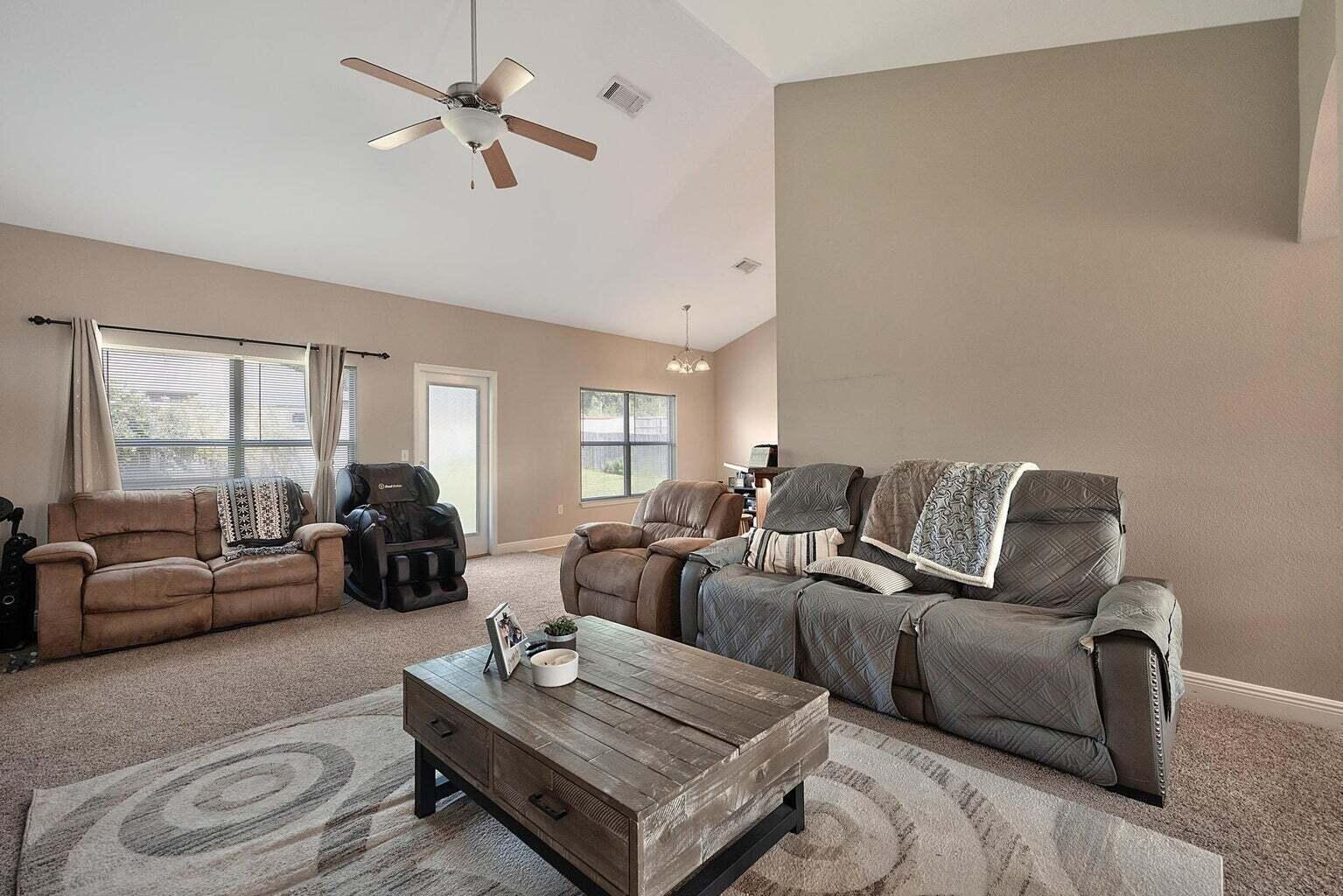 607 Rowan Circle Crestview, FL 32536 - Photo 3 of 27 a living room with furniture and a large window