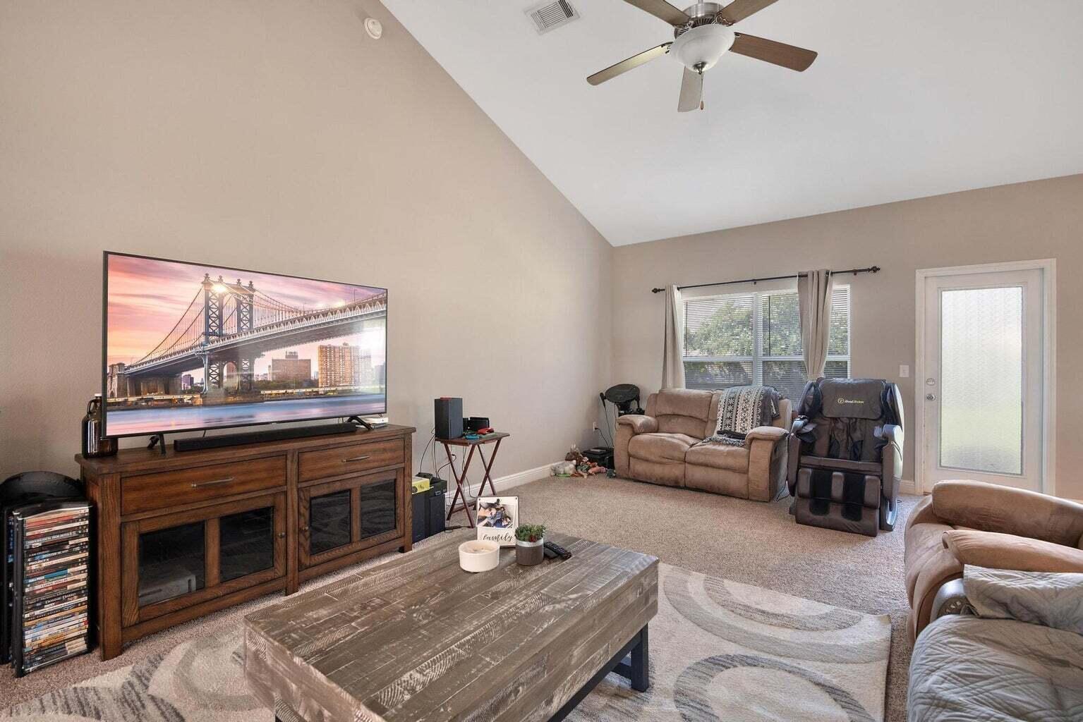 607 Rowan Circle Crestview, FL 32536 - Photo 4 of 27 a living room with furniture and a fireplace