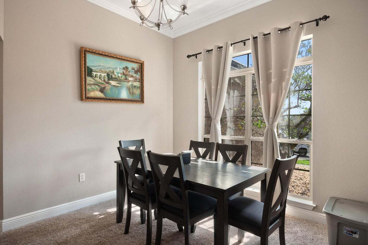607 Rowan Circle Crestview, FL 32536 - Photo 7 of 27 a dining room with furniture and window