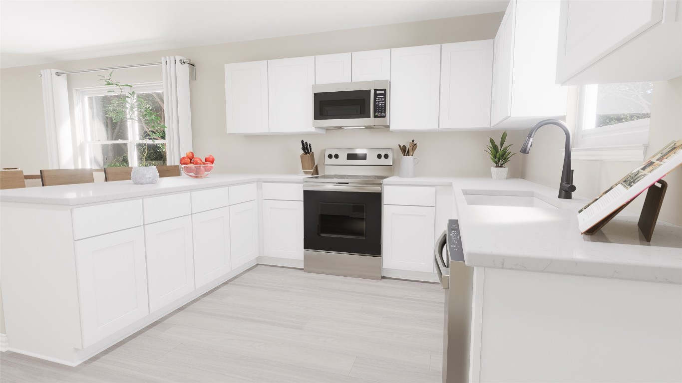 3820 Keller Road Temple, TX 76504 - Photo 8 of 21 a kitchen with stainless steel appliances white cabinets and a sink