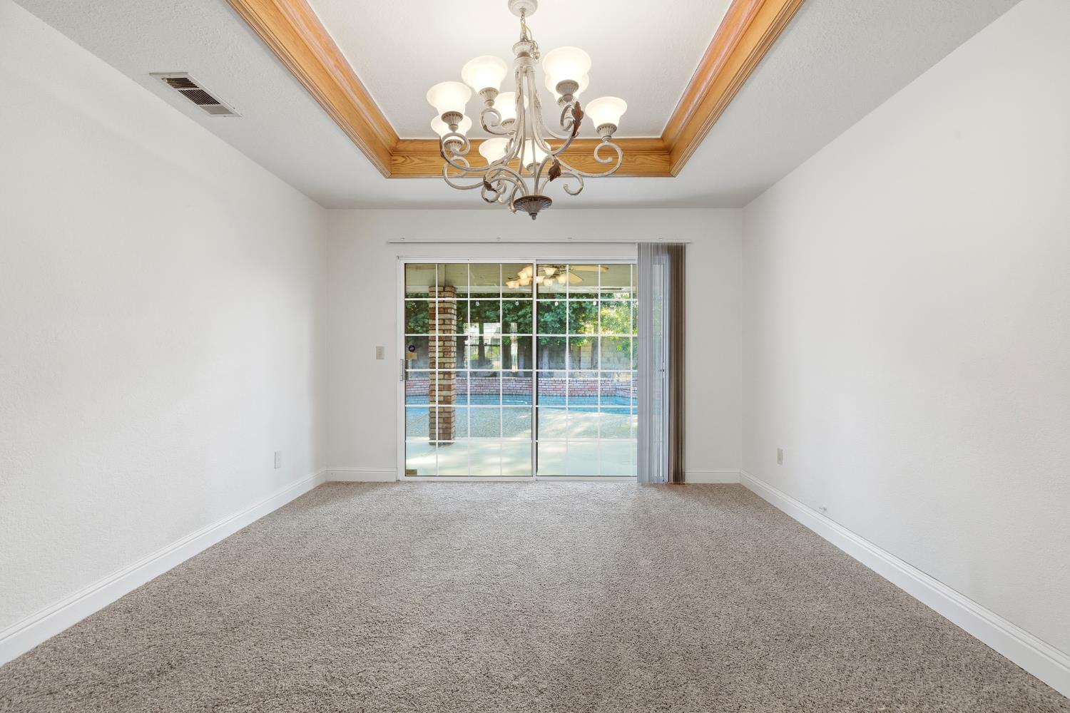 2304 Van Der Goes Way Modesto, CA 95356 - Photo 12 of 42 a view of an empty room with a window