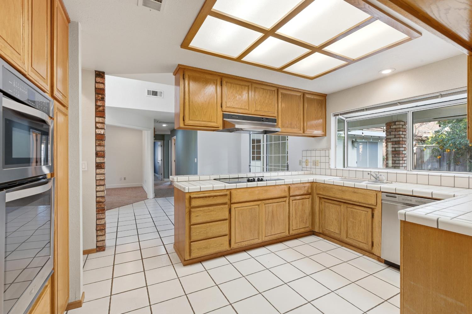 2304 Van Der Goes Way Modesto, CA 95356 - Photo 17 of 42 a kitchen with stainless steel appliances granite countertop a sink and cabinets
