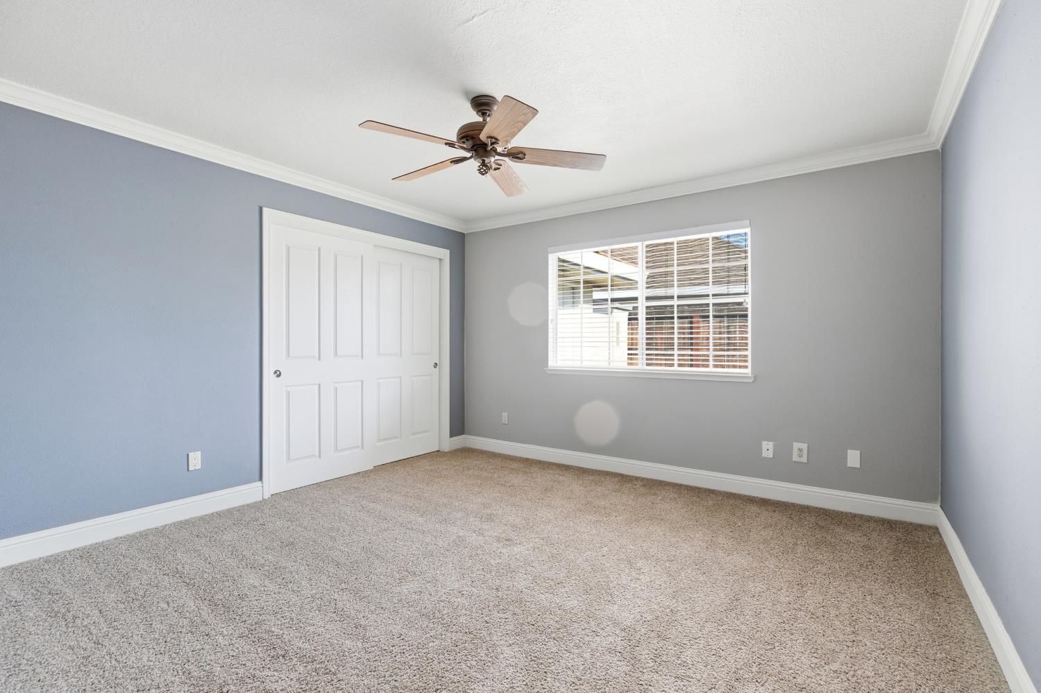 2304 Van Der Goes Way Modesto, CA 95356 - Photo 21 of 42 a view of an empty room with a window