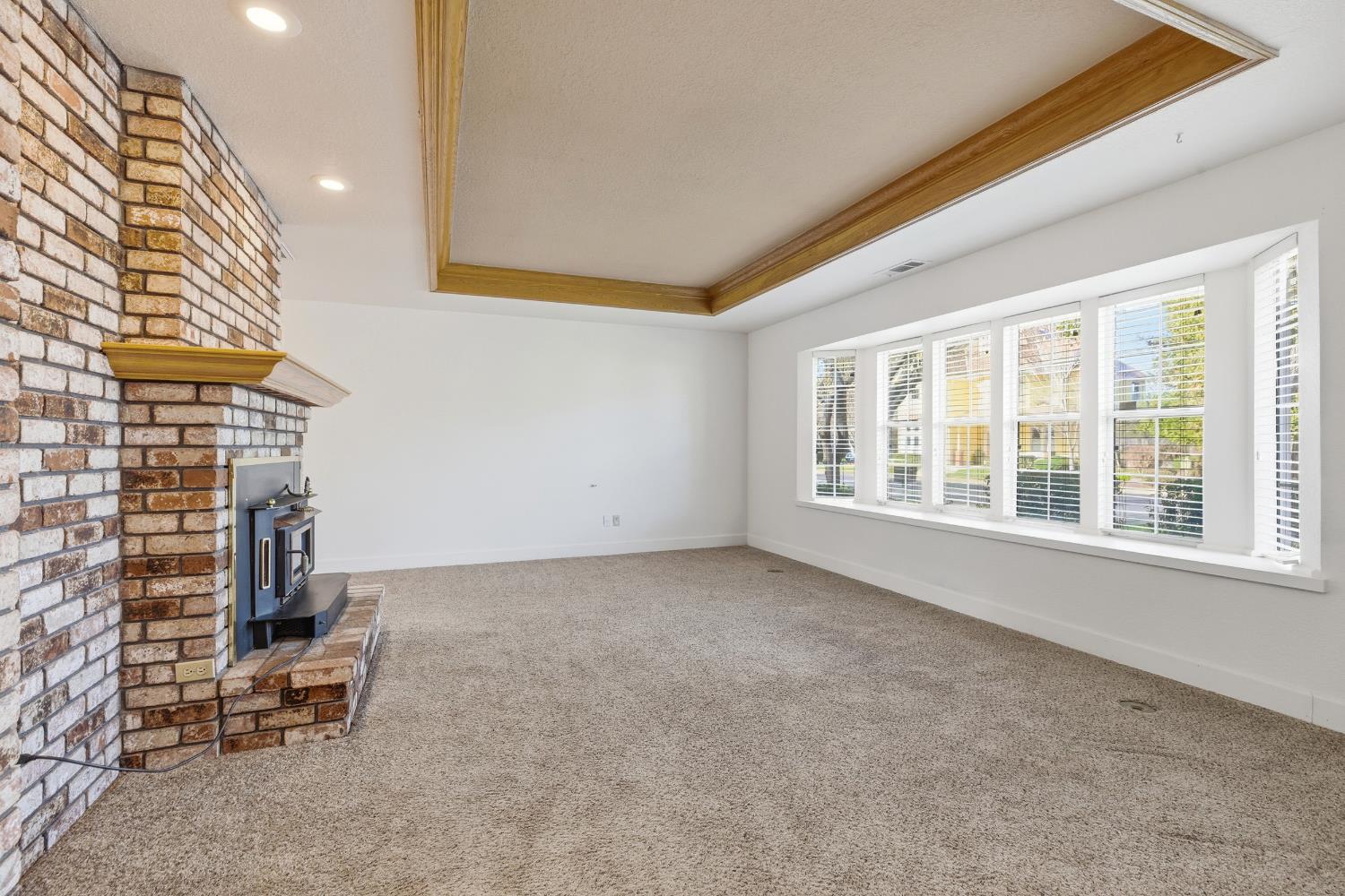 2304 Van Der Goes Way Modesto, CA 95356 - Photo 8 of 42 a view of an empty room with a window