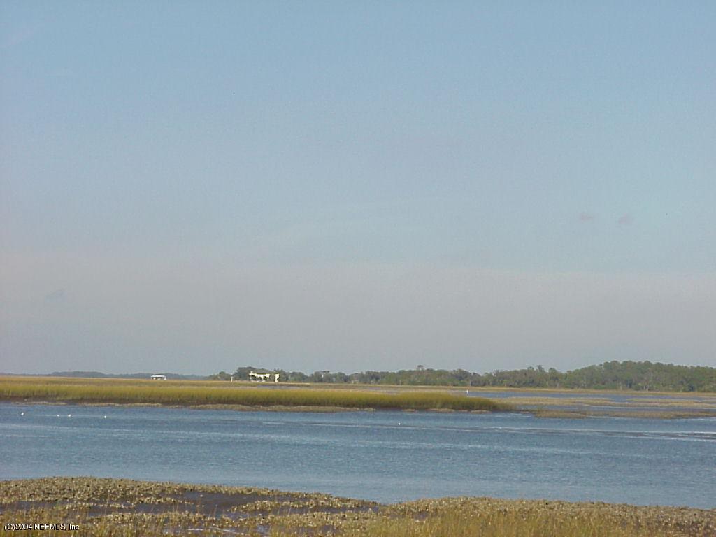 3767 Maranatha Road Yulee, FL 32097 - Photo 2 of 3 a view of an ocean and beach