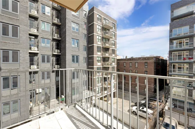 a view of a building from a balcony