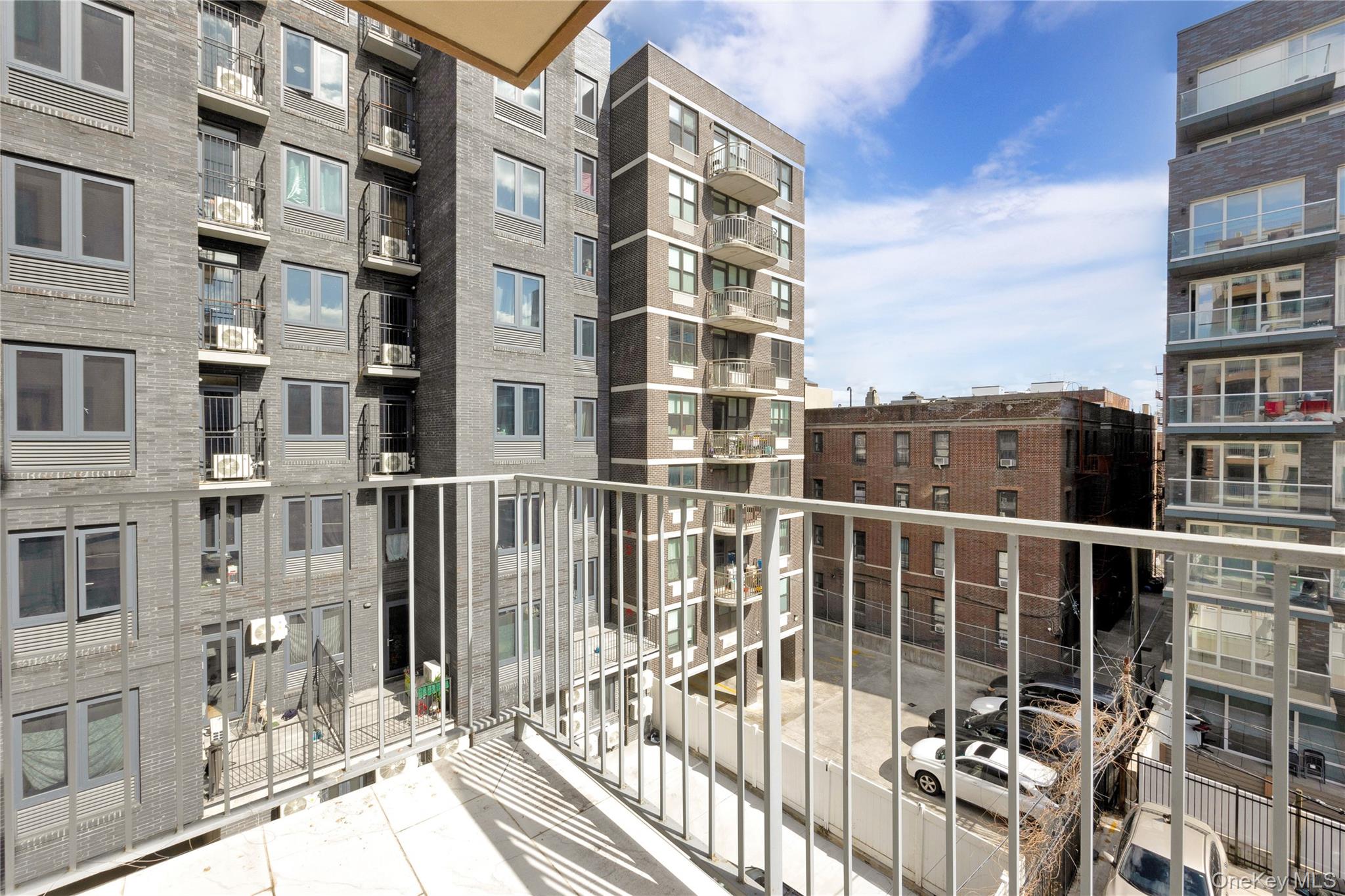 148-36 89th Avenue, Unit 204 Queens, NY 11435 - Photo 27 of 32 a view of a building from a balcony