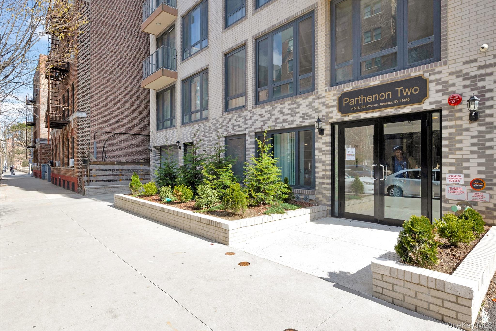 148-36 89th Avenue, Unit 204 Queens, NY 11435 - Photo 32 of 32 a view of a building with potted plants