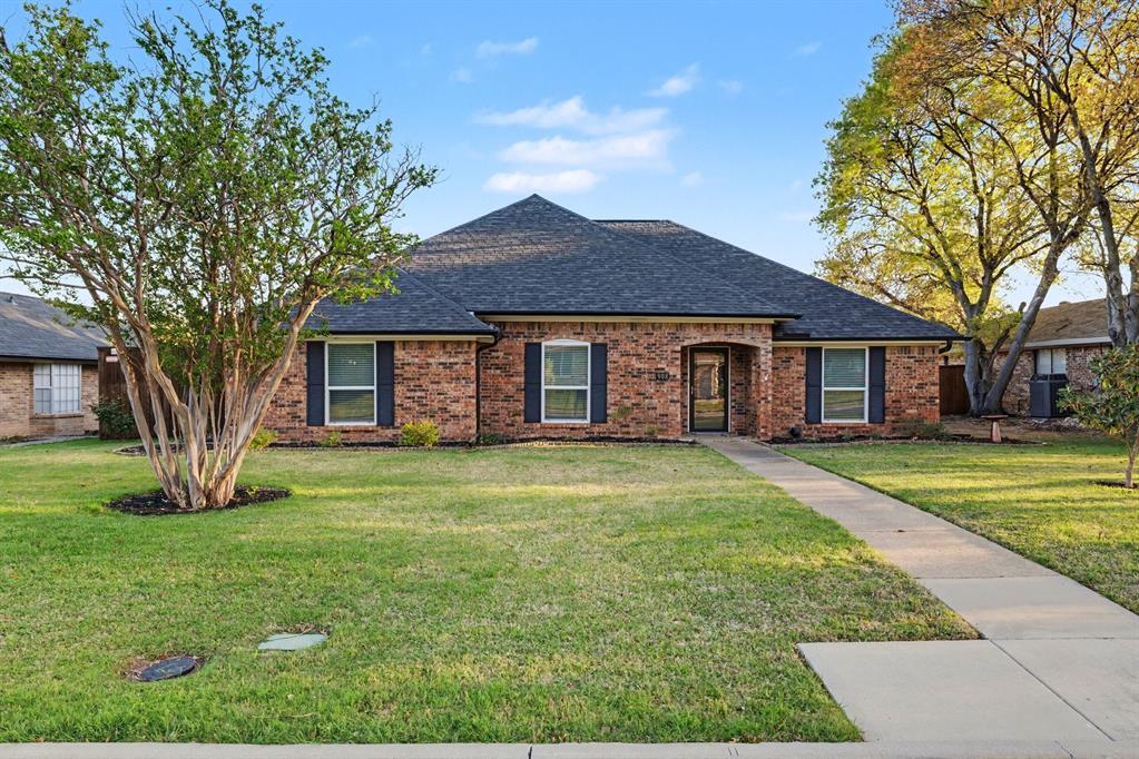 908 Thoreau Lane Allen, TX 75002 - Photo 1 of 31 a front view of a house with a garden