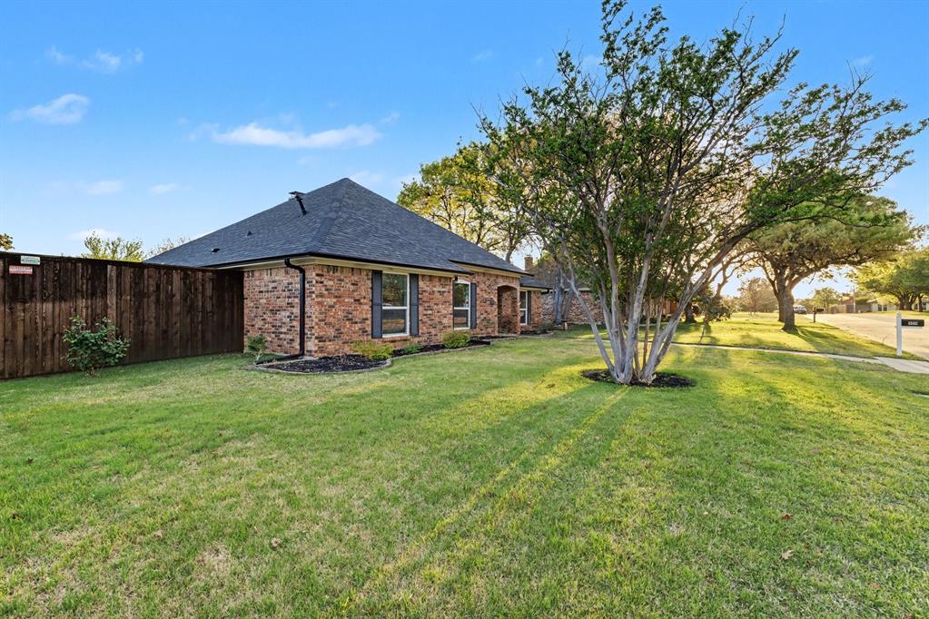 908 Thoreau Lane Allen, TX 75002 - Photo 31 of 31 a view of a house with a backyard