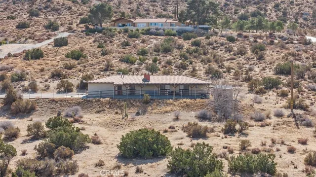 a view of outdoor space with wooden fence