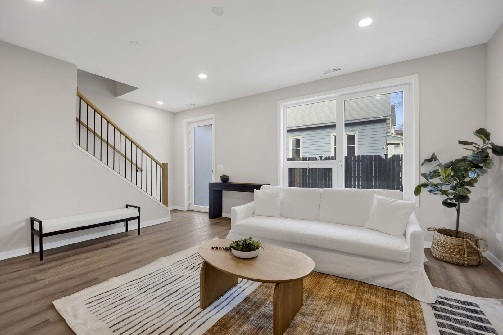 944 Beloit Avenue, Unit 2 Forest Park, IL 60130 - Photo 2 of 32 a living room with furniture and a wooden floor