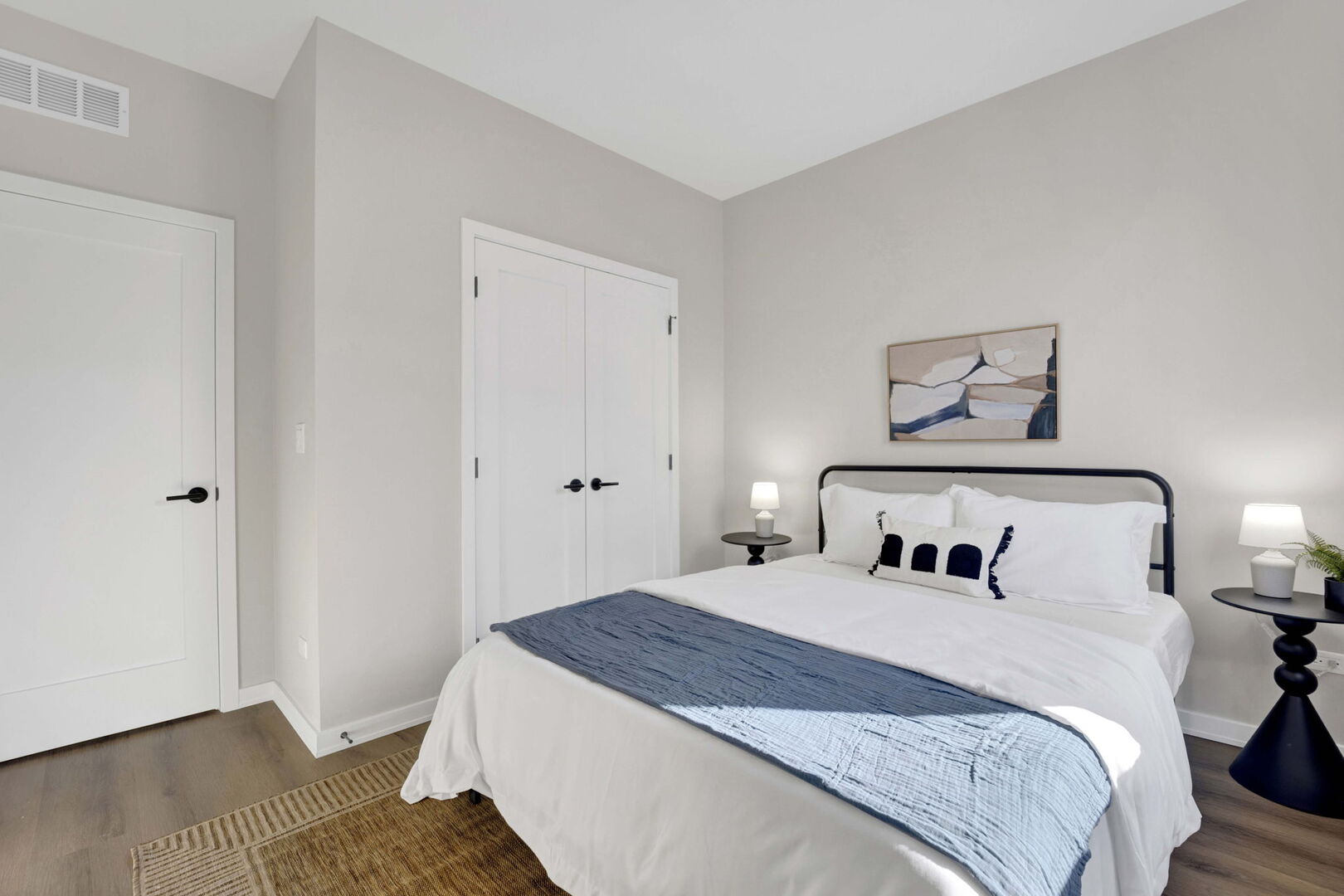 944 Beloit Avenue, Unit 2 Forest Park, IL 60130 - Photo 23 of 32 a bedroom with a bed and a night stand