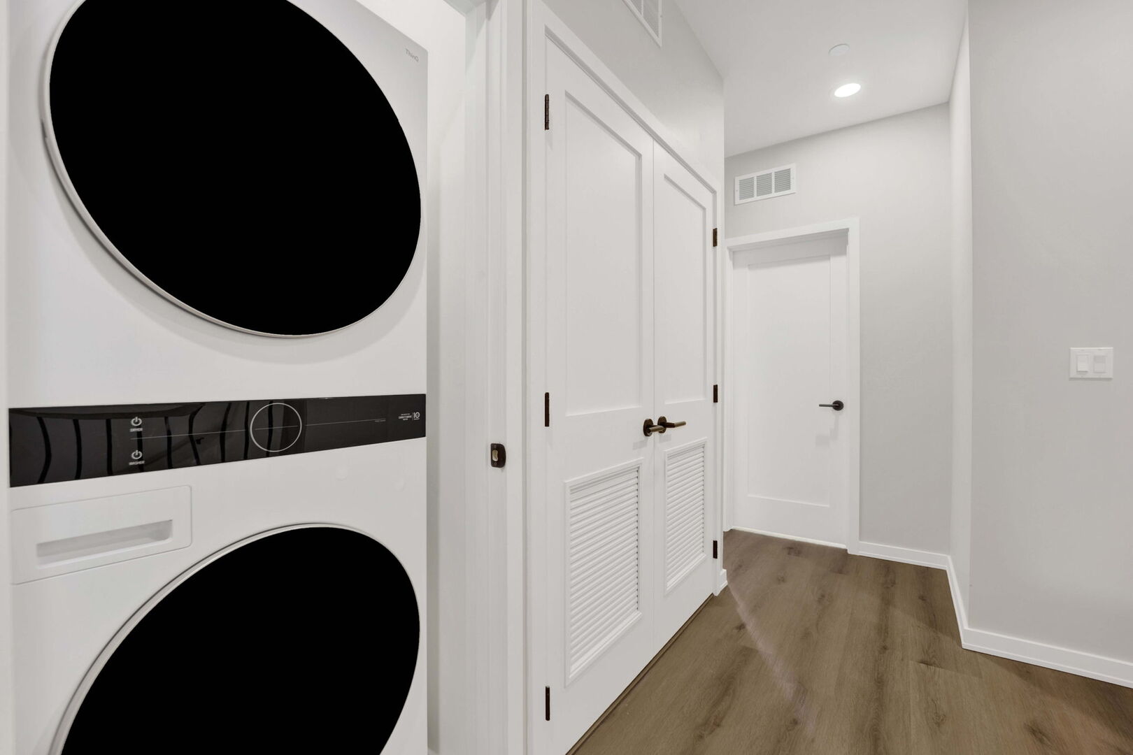 944 Beloit Avenue, Unit 2 Forest Park, IL 60130 - Photo 27 of 32 a view of a hallway with washer and dryer