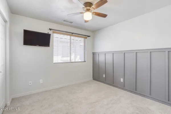 a bathroom with a sink double vanity and a mirror
