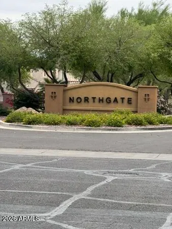 a balcony with table and chairs
