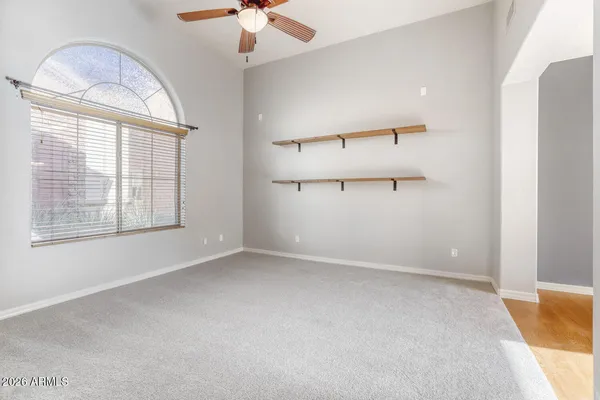 a view of a kitchen with cabinet and a fireplace