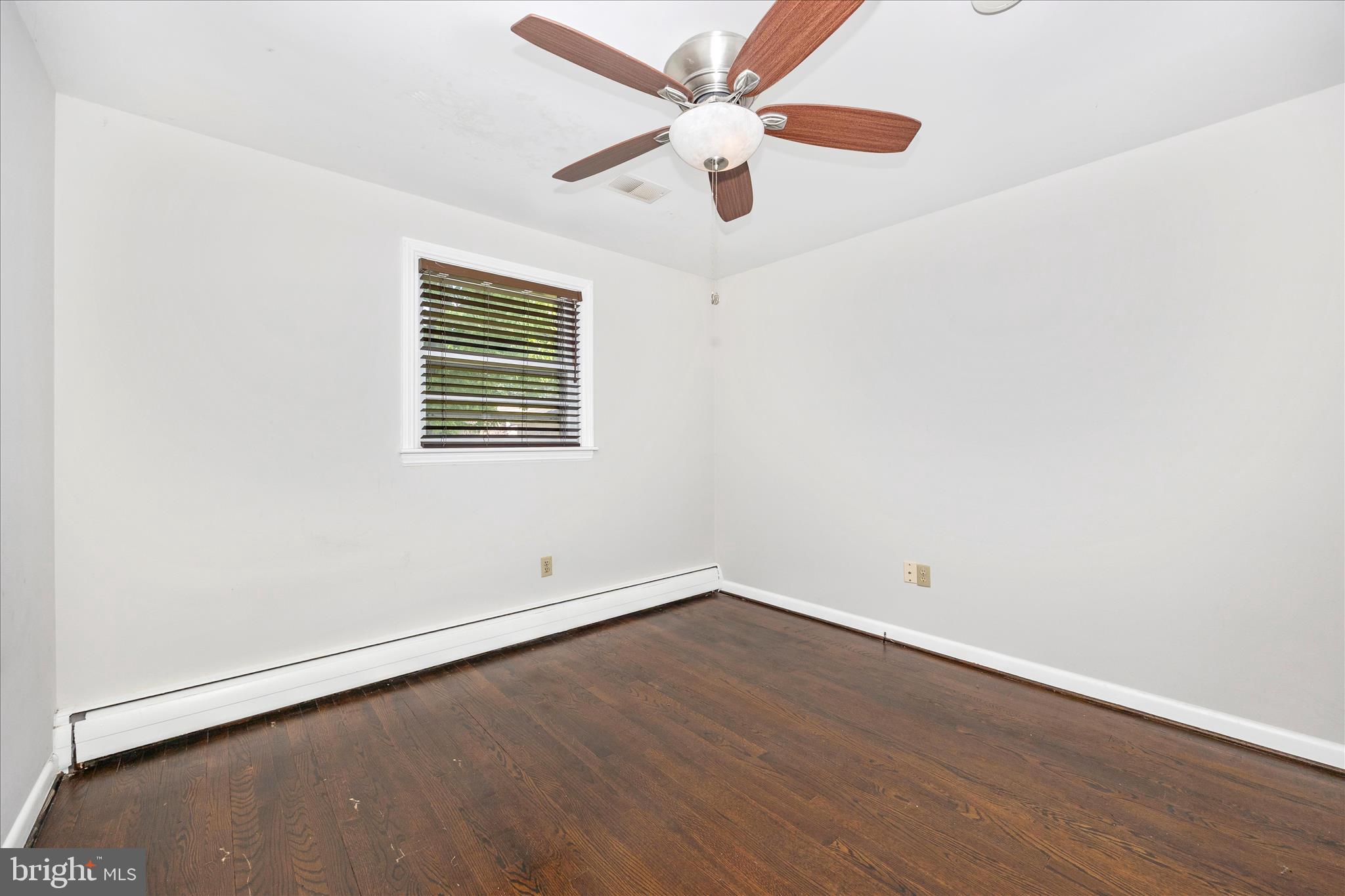 17 East 13th Street Frederick, MD 21701 - Photo 25 of 53 an empty room with a window and a fan