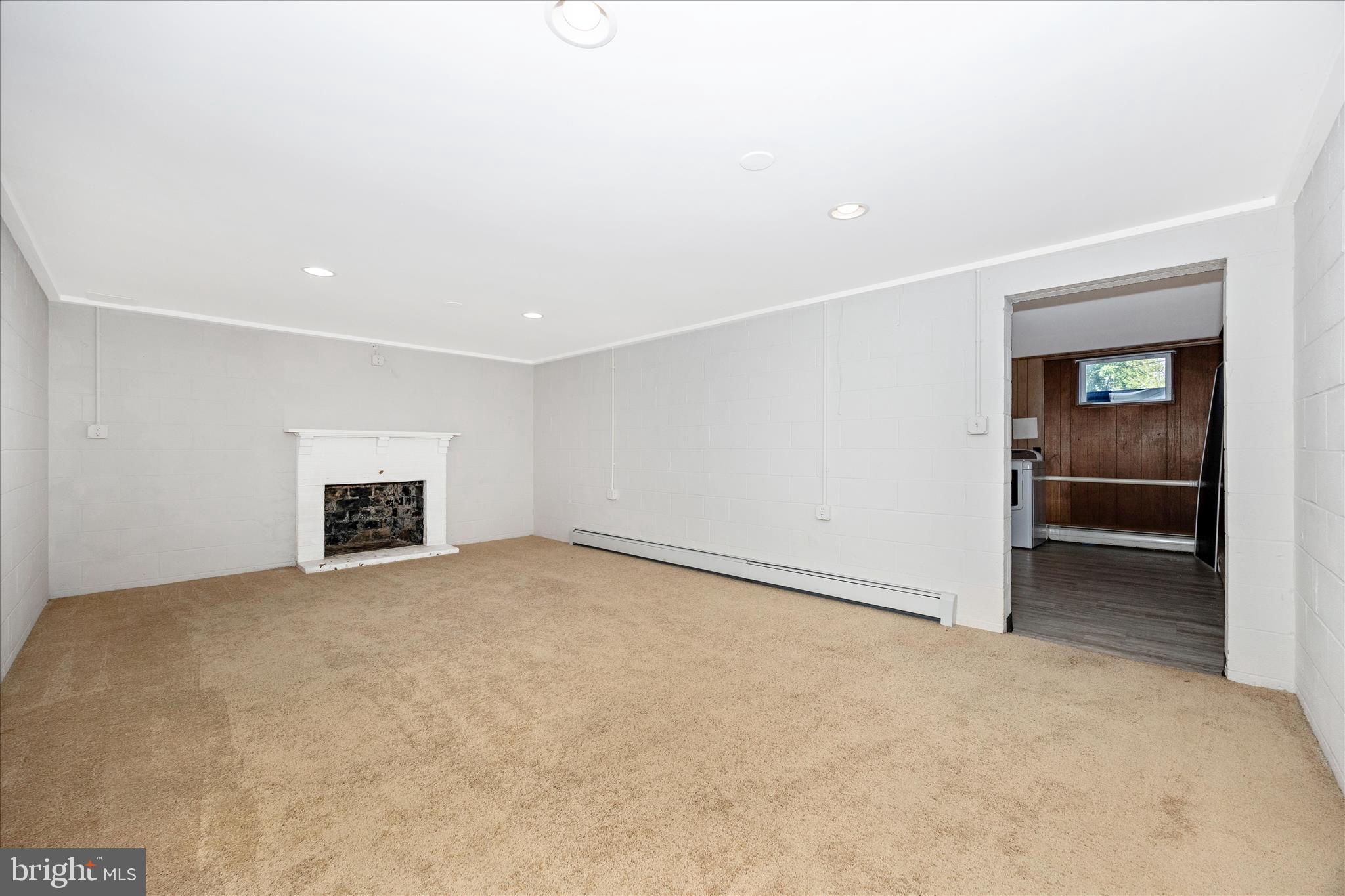 17 East 13th Street Frederick, MD 21701 - Photo 29 of 53 a view of an empty room with a fireplace