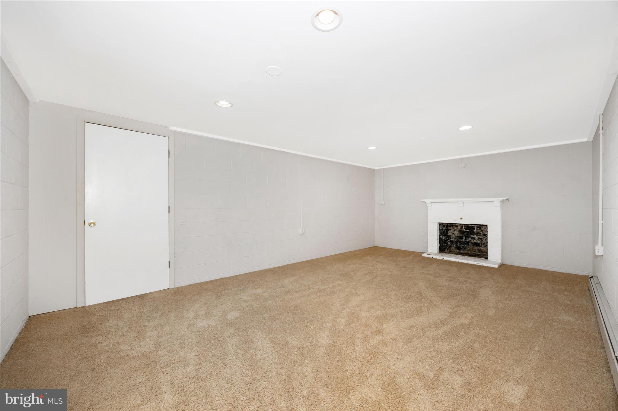 17 East 13th Street Frederick, MD 21701 - Photo 30 of 53 a view of an empty room with a fireplace