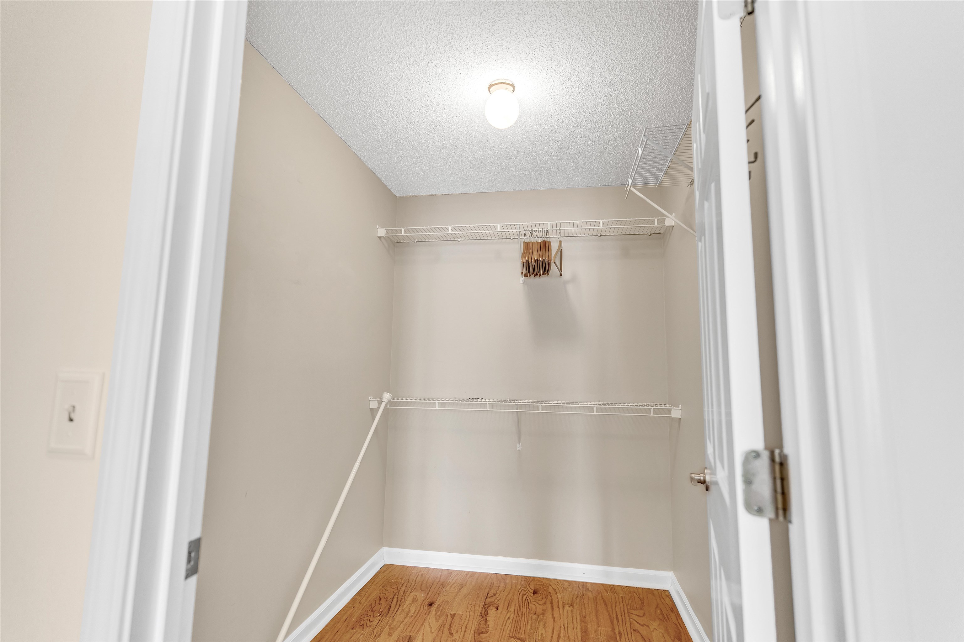 1213 Oak Timber Circle, Unit 25 Collierville, TN 38017 - Photo 17 of 25 Spacious closet with wood finished floors