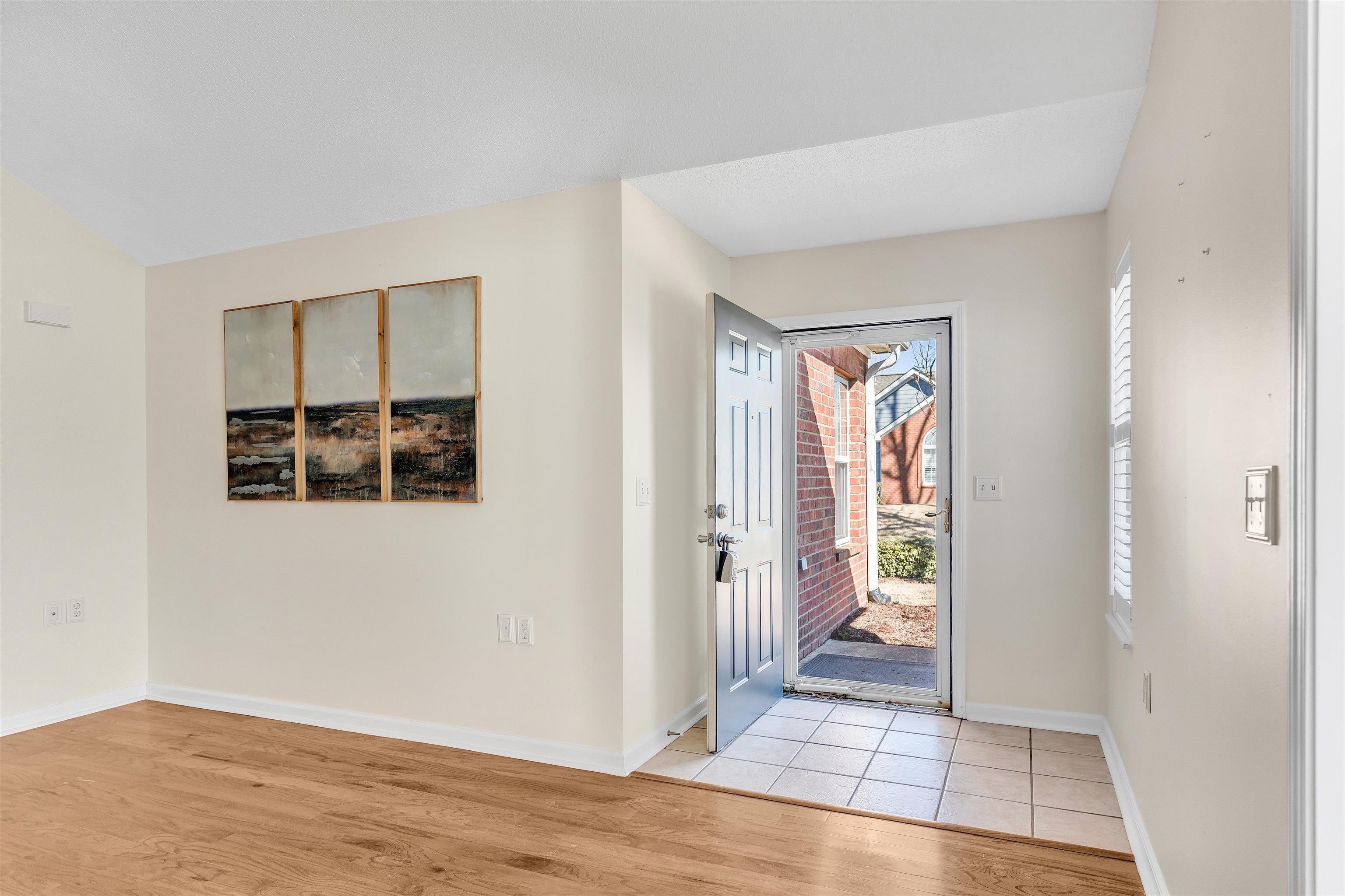 1213 Oak Timber Circle, Unit 25 Collierville, TN 38017 - Photo 6 of 25 Foyer featuring light wood finished floors and baseboards