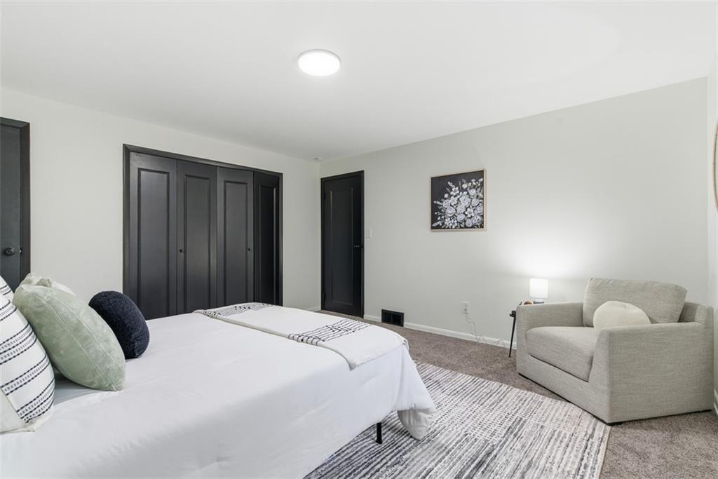 125 South Jamestown Road Coraopolis, PA 15108 - Photo 22 of 44 a bedroom with bed and a couch