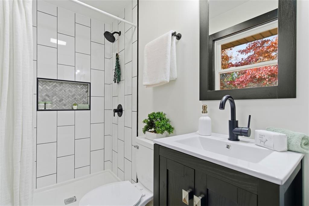 125 South Jamestown Road Coraopolis, PA 15108 - Photo 23 of 44 a bathroom with a sink a toilet and shower