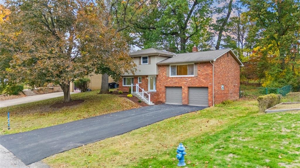 125 South Jamestown Road Coraopolis, PA 15108 - Photo 3 of 44 a view of a house with pool and chairs