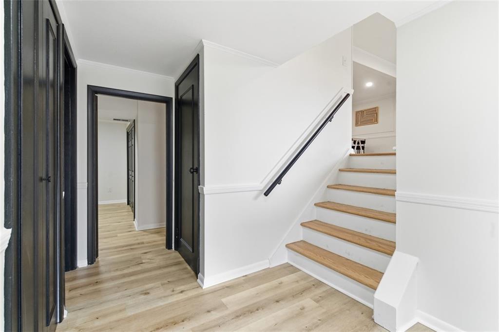 125 South Jamestown Road Coraopolis, PA 15108 - Photo 6 of 44 a view of a hallway with wooden floor and entryway