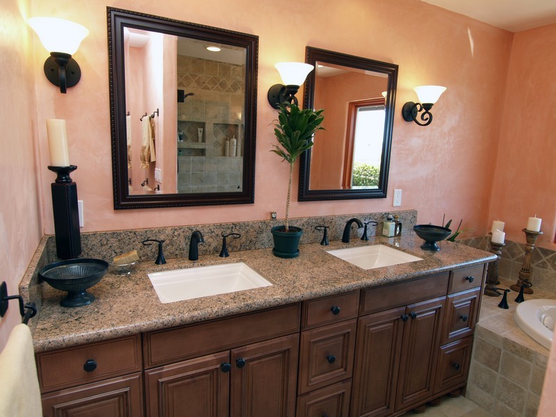426 Las Alturas Road Santa Barbara, CA 93103 - Photo 5 of 7 a bathroom with a granite countertop sink and a mirror
