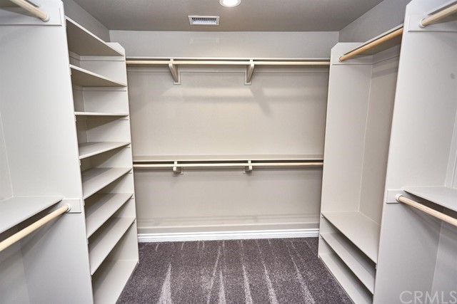 22227 Skyline Drive Apple Valley, CA 92308 - Photo 24 of 34 a view of an empty walk in closet