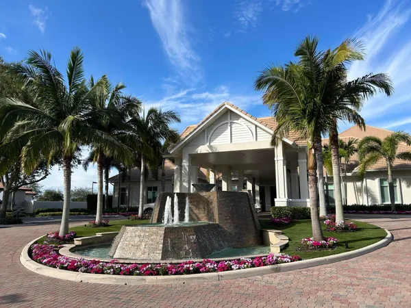a view of a park with palm trees