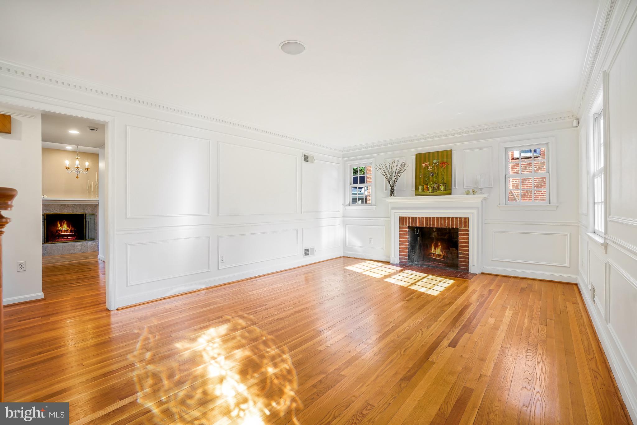 9502 Edgeley Road Bethesda, MD 20814 - Photo 2 of 46 Living room w/ wood buring fireplace